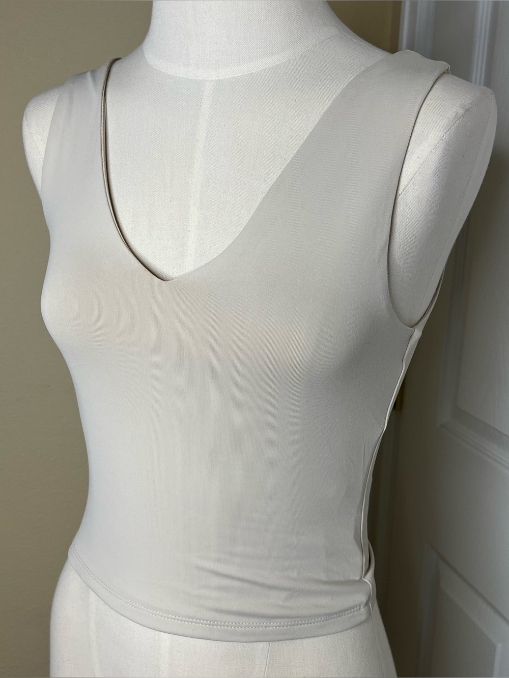 Sleek Cream V-Neck Sleeveless Tank